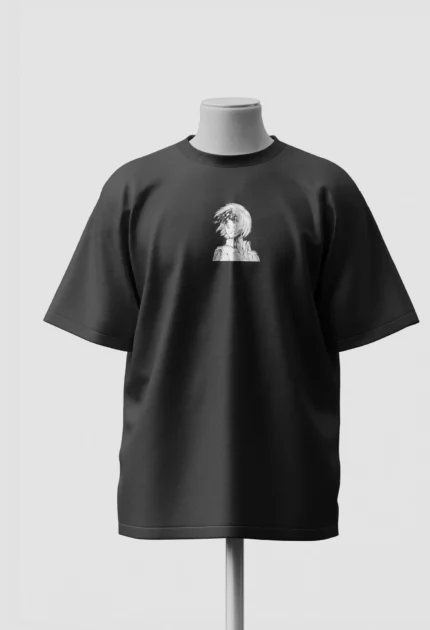 Small white figure printed on the chest of a black Attack on Titan oversized t-shirt