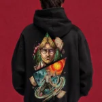 Model wearing a black Attack on Titan hoodie, back view with Zeke portrait and character collage