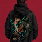 Model wearing a black Attack on Titan hoodie, back view with Eren with blue lightning