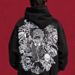 Black Attack on Titan hoodie with monochrome Titan collage back print, worn by a model