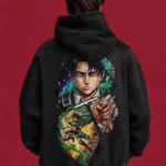 Model wearing black Levi Ackerman hoodie, back view with colourful battle collage
